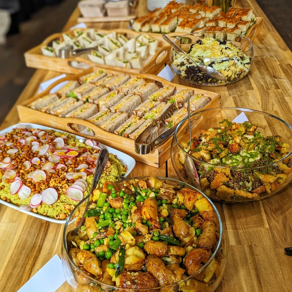 Sandwich platters with seasonal salads and vegetables for a corporate buffet