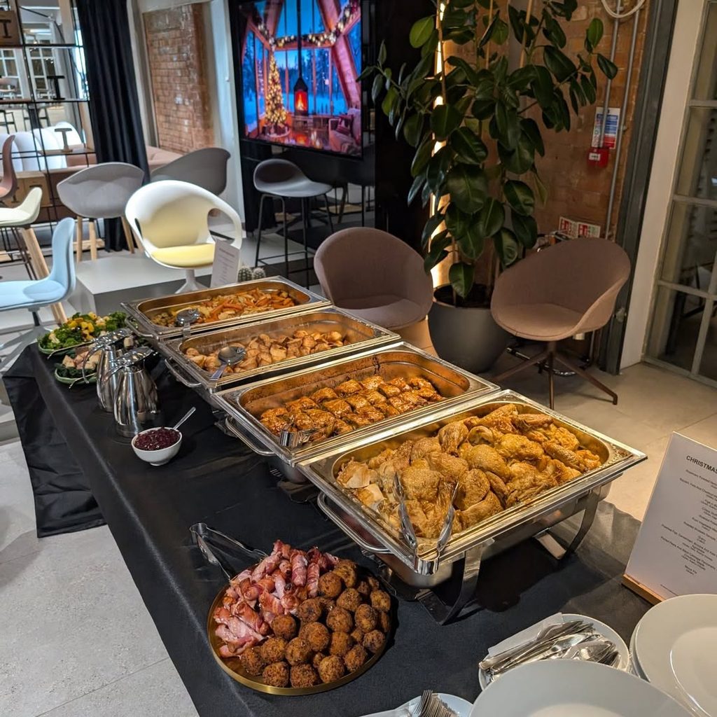Hot buffet with roasted meats, potatoes and seasonal sides at a London event