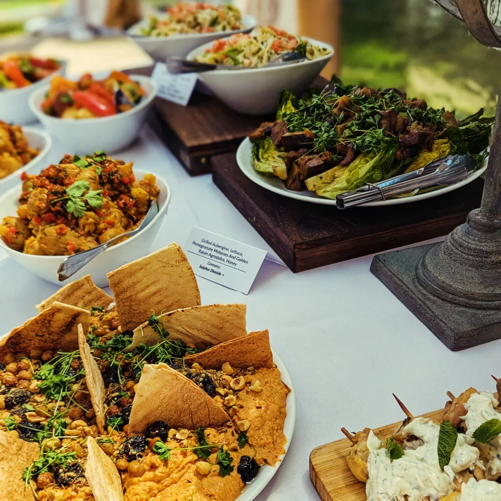 Mediterranean buffet with hummus, flatbreads, salads and roasted vegetables