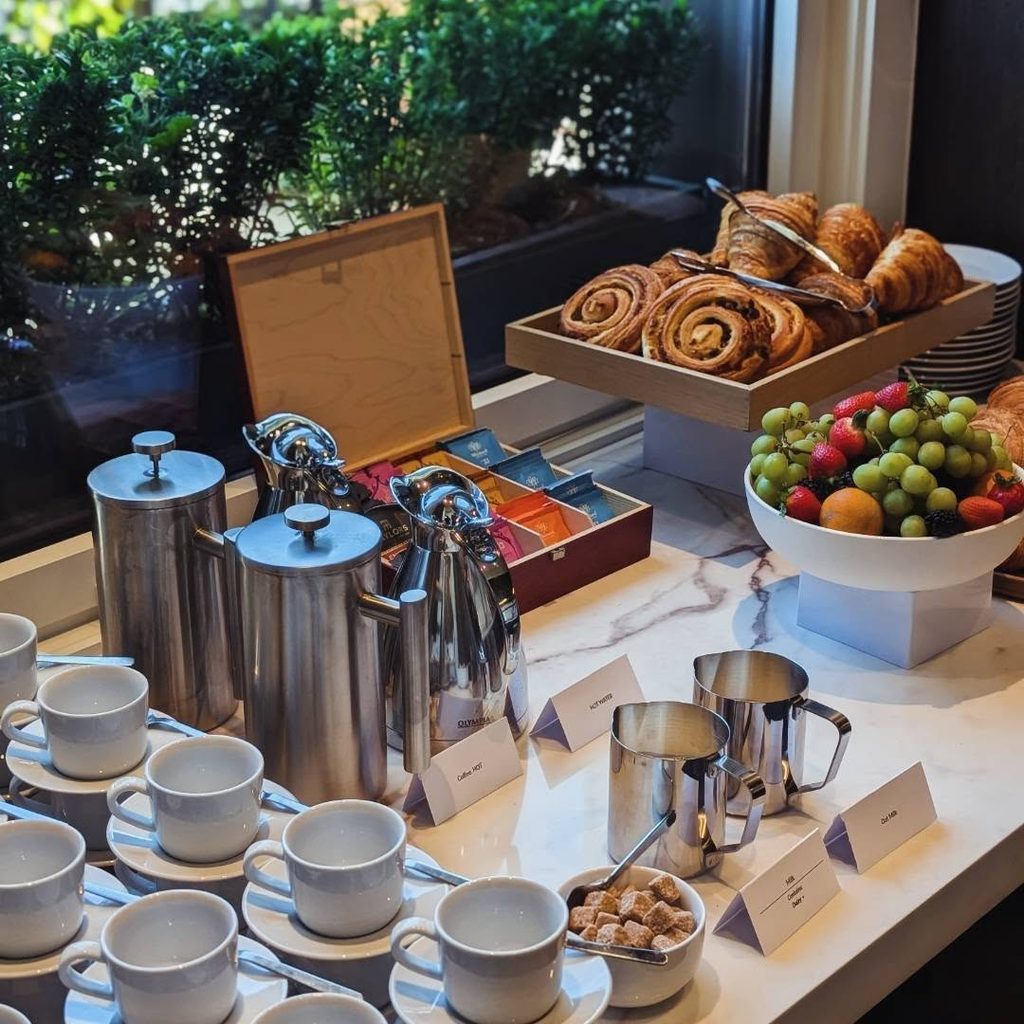 Corporate breakfast catering with pastries, fruit, tea and coffee